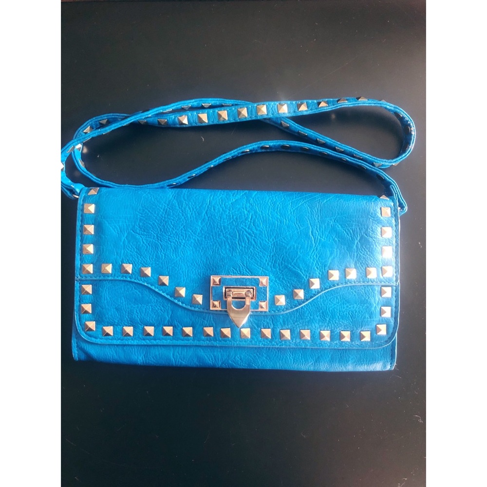 Blue studded clutch